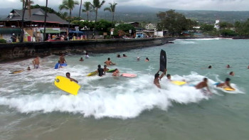 Bodyboarders tossed about in the Washing Machine by Kailua Pier