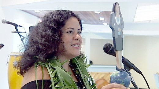 Dr. Maya Soetoro-Ng holding her Aloha Peace Prize