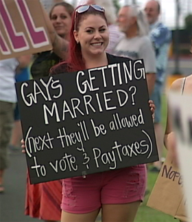 Sign waving in Hilo in advance of the state's special session on same sex marriage