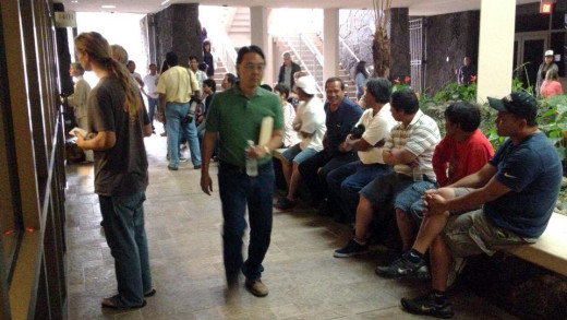 A crowd sits outside the #Hawaii County Council chamber as public testimony is heard on bill 113.