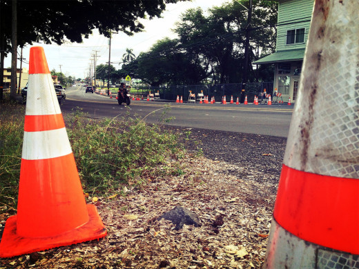 Orange cones frame ongoing work on Kilauea Avenue
