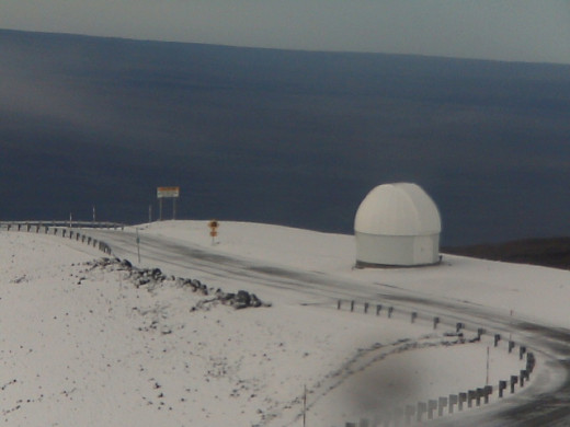 Snow image captured by UH Hilo Web Cam: Physics and Astronomy. This was taken at about 8:50 a.m. HST