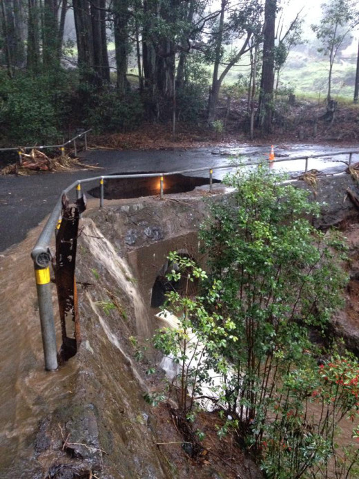 This view shows the sinkhole in relation to the culvert underneath. Photo by Liana Iaea Honda.