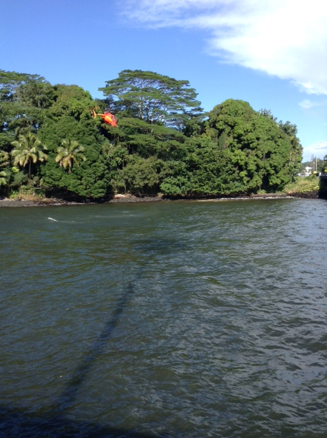 Helicopter searches the Wailuku River on Monday