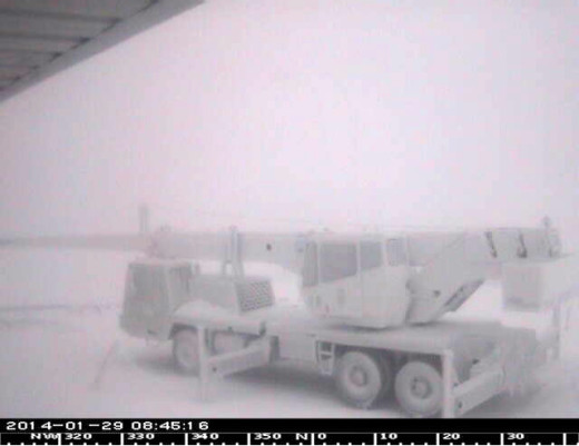 Usually this Canada France Hawaii Telescope view shows the Gemini Observatory located behind the truck in the foreground. Not today.  Taken at 8:45 a.m. HST