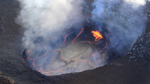 Mar 7, 2014: The lava lake in the Overlook crater, within Halemaʻumaʻu Crater, at Kīlauea's summit remains active. Today, winds carried the plume towards the north, providing a clear view of the persistent spattering area in the southeast portion of the lake. (USGS HVO photo)