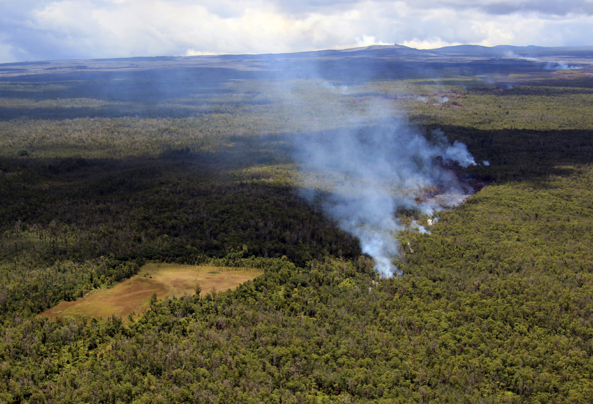 Photo by USGS HVO, shows June 27 lava flow nearing the geothermal well site in Wao Kele O Puna Forest.