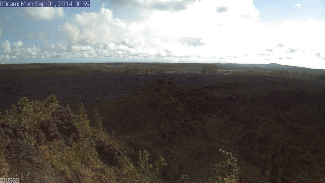 This image is from a USGS Hawaiian Volcano Observatory research camera positioned northeast of Puʻu ʻŌʻō, near the east margin of the lava flow field. It is monitoring the June 27th lava flow. The camera - which can be seen online - looks northeast, down the East Rift Zone.