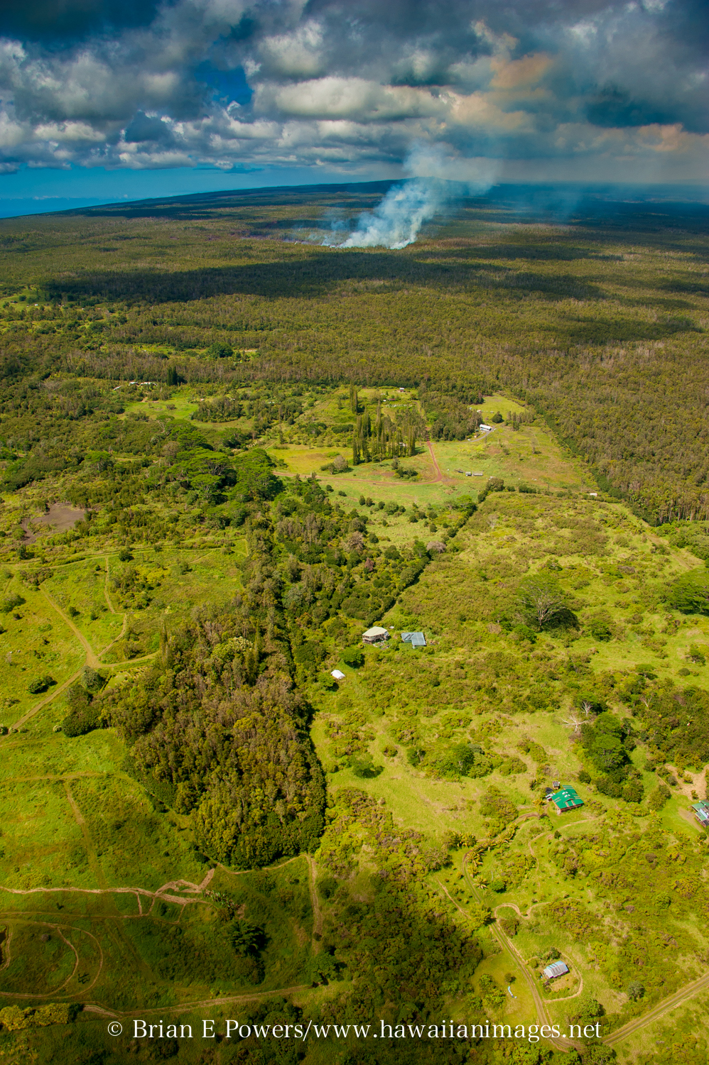 (Courtesy Brian Powers, http://www.hawaiianimages.net ) Photo shows the proximity of the lav flow to Kaohe Homesteads near Pahoa.  