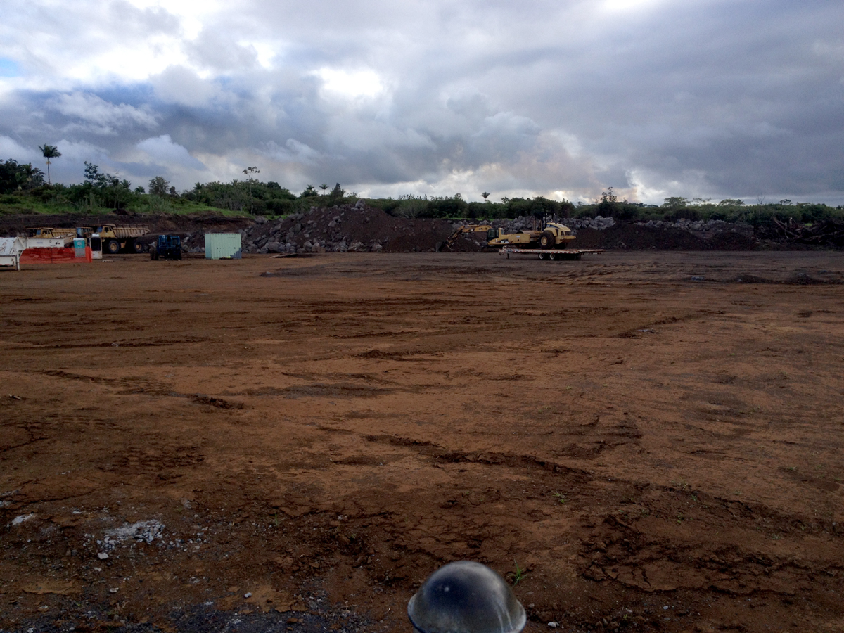 The $22.3 million Pahoa District Park project has been put on hold as a lava flow approaches. The cleared land sits quiet, for now.