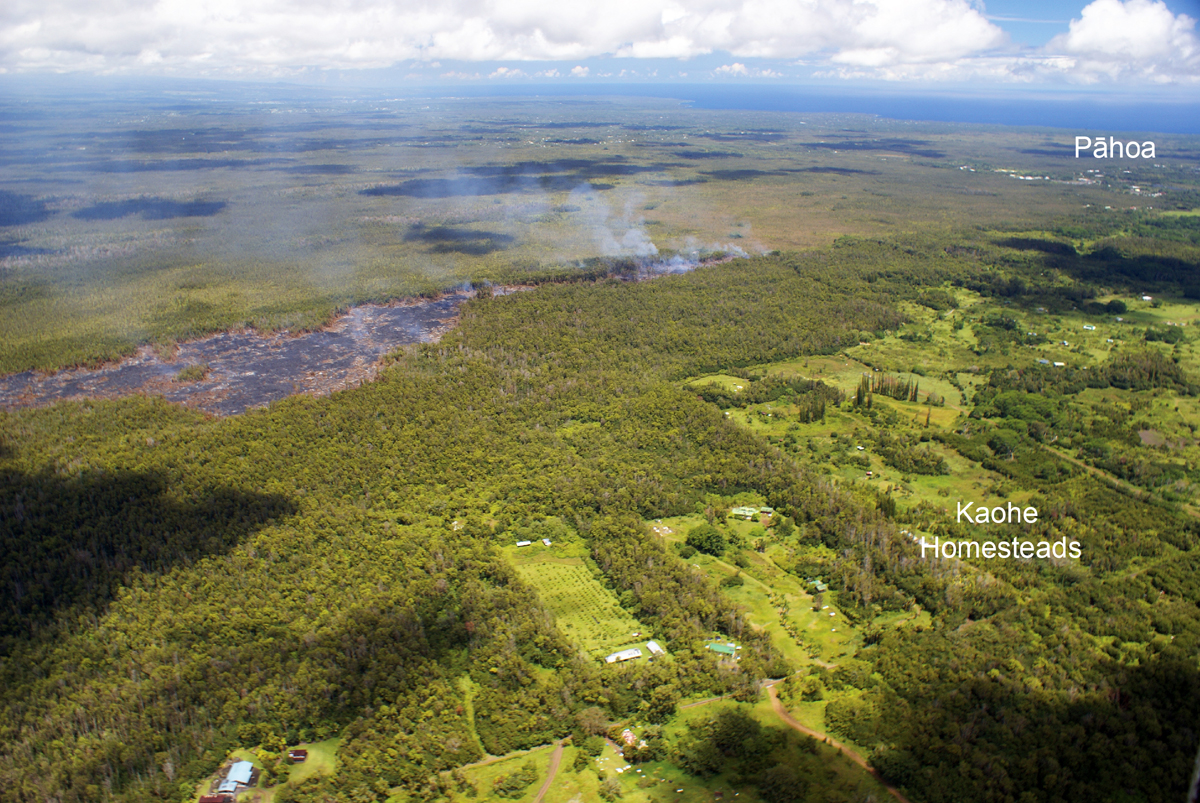 USGS HVO captures the view of the flow front, looking north. Pāhoa is located in the upper right portion of the photograph. The flow front today was 3.4 km (2.1 miles) from Pāhoa Village Road.