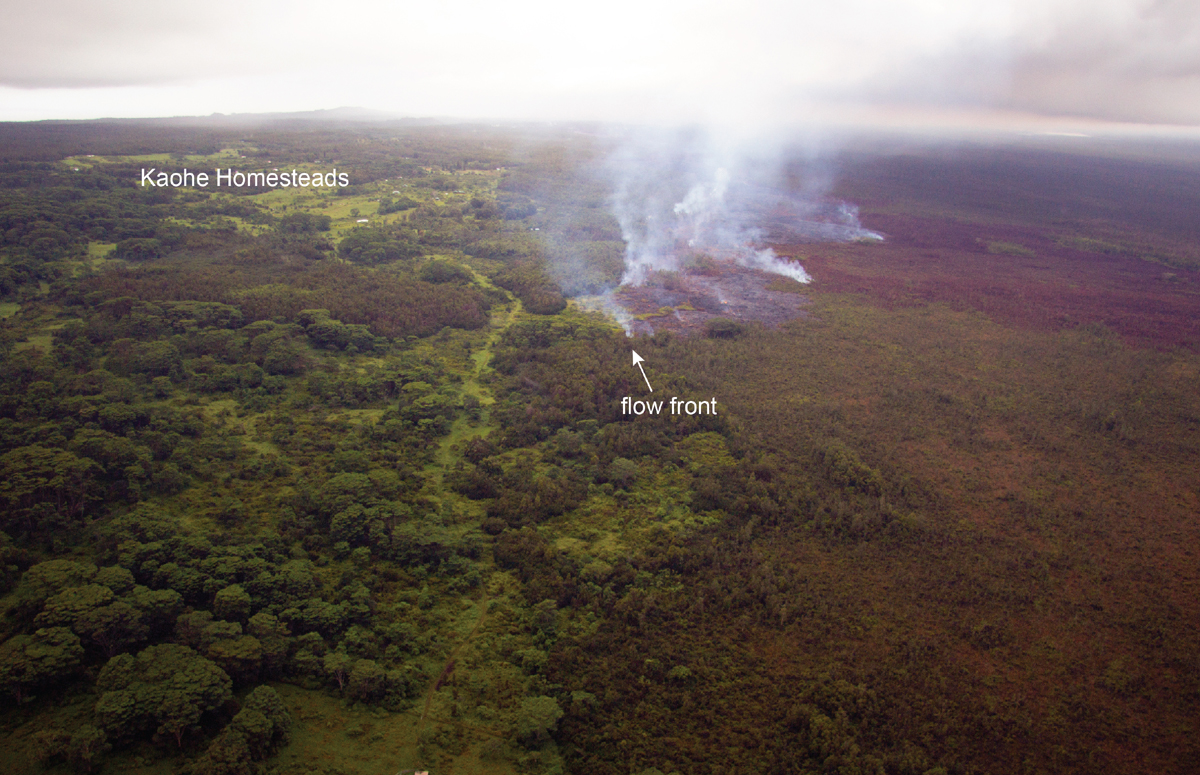 USGS HVO photo: "The June 27th lava flow remains active, but has advanced only a minor distance - about 50 m (55 yards) - over the past two days. Activity persists around the flow front, however, with numerous scattered breakouts. The flow front this morning was 1.1 km (0.7 miles) from Apaʻa St., as measured along a straight line."