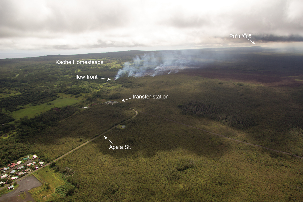 USHS HVO photo from Oct. 22 shows a wider view of the flow front, showing its proximity to Apaʻa St. and the transfer station. The vent for the June 27th lava flow is on Puʻu ʻŌʻō cone, which can be seen in the upper right portion of the photograph. The residential area in the lower left corner is in the western portion of Pāhoa.