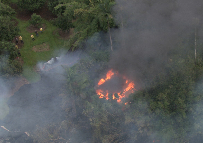 Still from video showing the farm structure burning from lava in Pahoa on Oct. 28