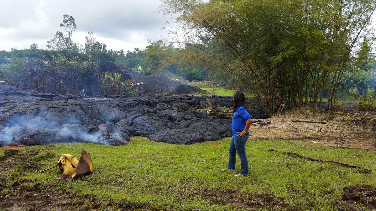 Rep. Tulsi Gabbard surveys the lava flow mon private property in Pahoa. Photo courtesy Office of Congresswoman Tulsi Gabbard.