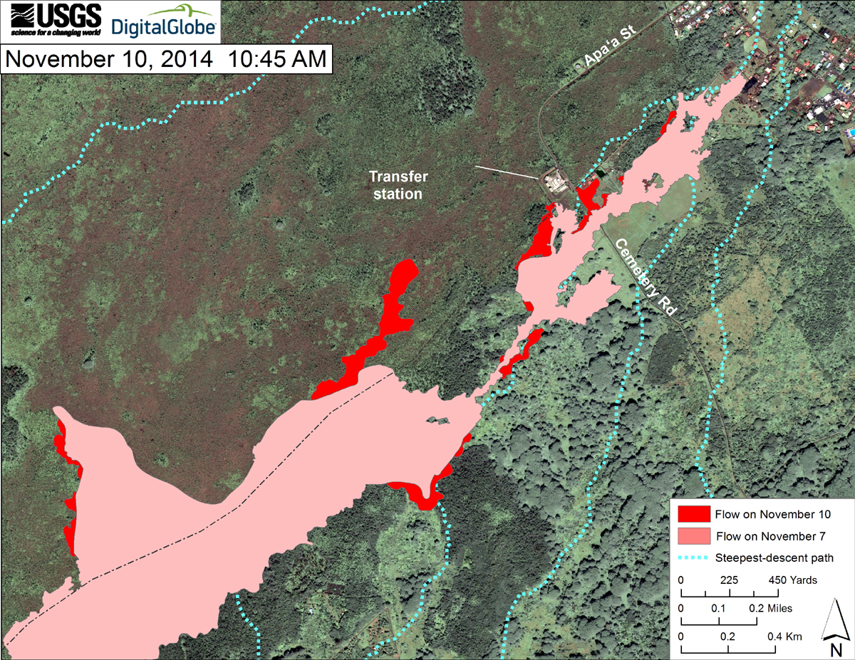 This USGS map uses a satellite image acquired in March 2014 (provided by Digital Globe) as a base at 1:13,000 scale to show the area around the front of the June 27th lava flow. The area of the flow on November 7, 2014, at 3:30 PM is shown in pink, while expansion of the flow as mapped on November 10 at 10:45 AM is shown in red. The latitude and longitude of the front of the narrow finger of lava advancing toward Pāhoa was 19.49590, -154.95256 (Decimal Degrees; WGS84). The dotted blue lines show steepest-descent paths in the area, calculated from a 1983 digital elevation model (DEM).