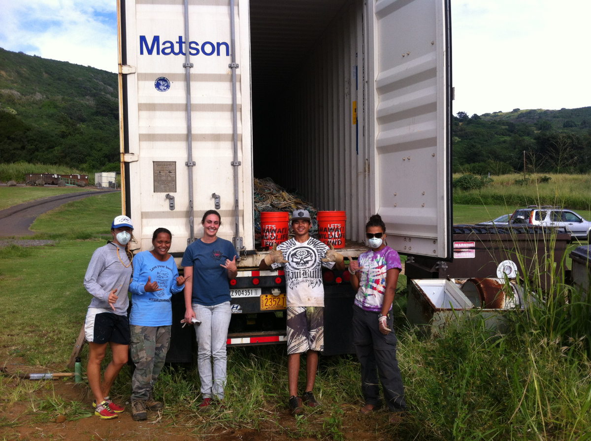 From the Hawaii Wildlife Fund: "Group image of the net loading team with the container of nets in the background.  L to R (with affiliations): Megan Lamson/HWF, Nohealani Ka'awa/DLNR-DOFAW, Stacey Breining/HWF, Ryan Levita/HWF, and Kallie Barnes/HWF."