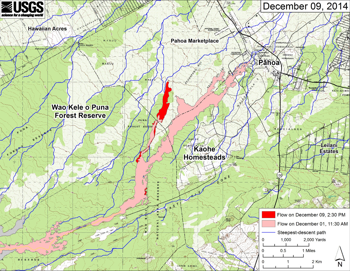 This USGS large-scale map shows the distal part of Kīlauea’s active East Rift Zone lava flow in relation to nearby Puna communities. The area of the flow on December 1, 2014, at 11:30 AM is shown in pink, while widening and advancement of the flow as mapped on December 9 at 2:30 PM is shown in red.