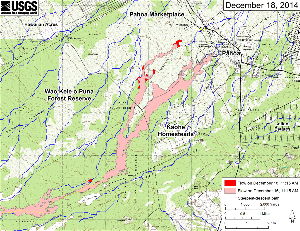 This large-scale USGS map shows the distal part of Kīlauea’s active East Rift Zone lava flow in relation to nearby Puna communities. The area of the flow on December 16 at 11:15 AM is shown in pink, while widening and advancement of the flow as mapped on December 18 at 11:15 AM is shown in red.