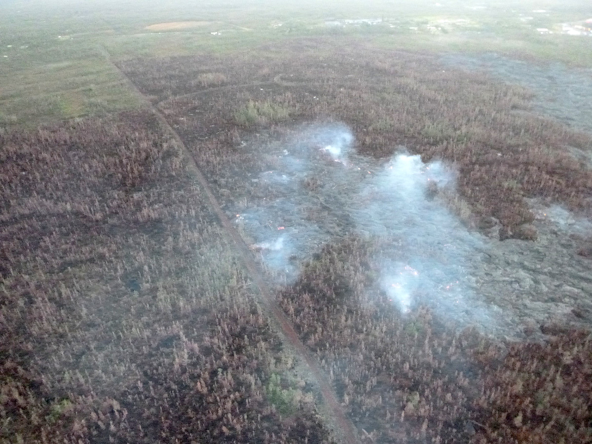 Image from the Feb. 23 civil defense overflight, looking down slope towards Highway 130.