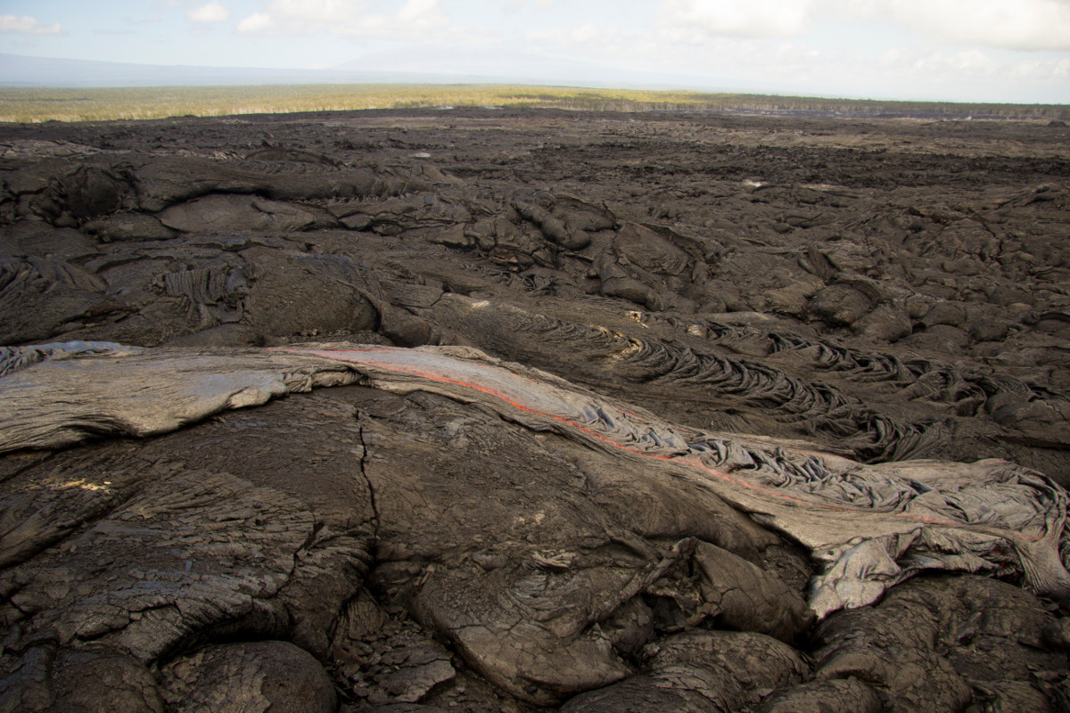 Feb. 23, 2014 (USGS) A small lobe of pāhoehoe on the new breakout on Puʻu ʻŌʻō.