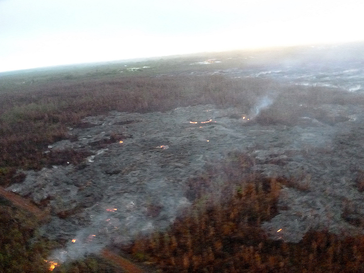 Feb. 25 (civil defense photo) - Image from this morning’s overflight - breakout along north margin, looking down slope towards Highway 130.