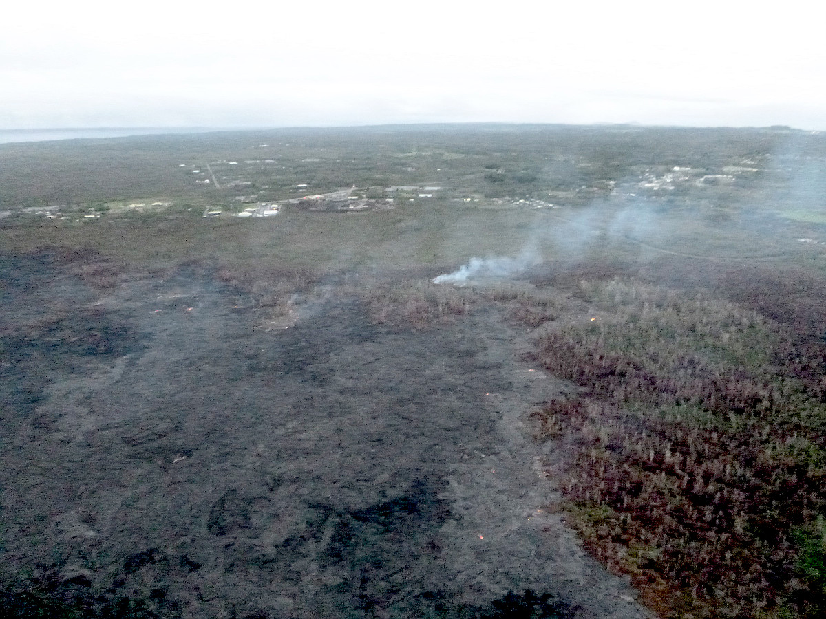 March 10, 2015: Image from this morning’s civil defense overflight shows the view over the south flow margin, looking down slope towards Hwy 130, Pahoa Marketplace, and Apaa Street.