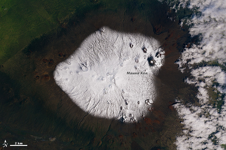 The Operational Land Imager (OLI) on Landsat 8 captured a view of the snow-capped summit on March 10, 2015. Courtesy NASA.