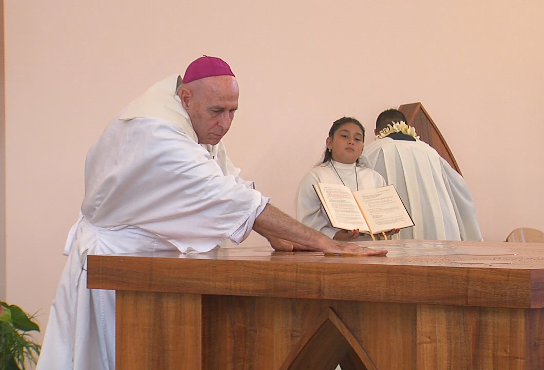 Most Reverend Larry (Clarence) Silva, Bishop of Honolulu, anoints the alter of the new St. Michael's church in Kailua-Kona.