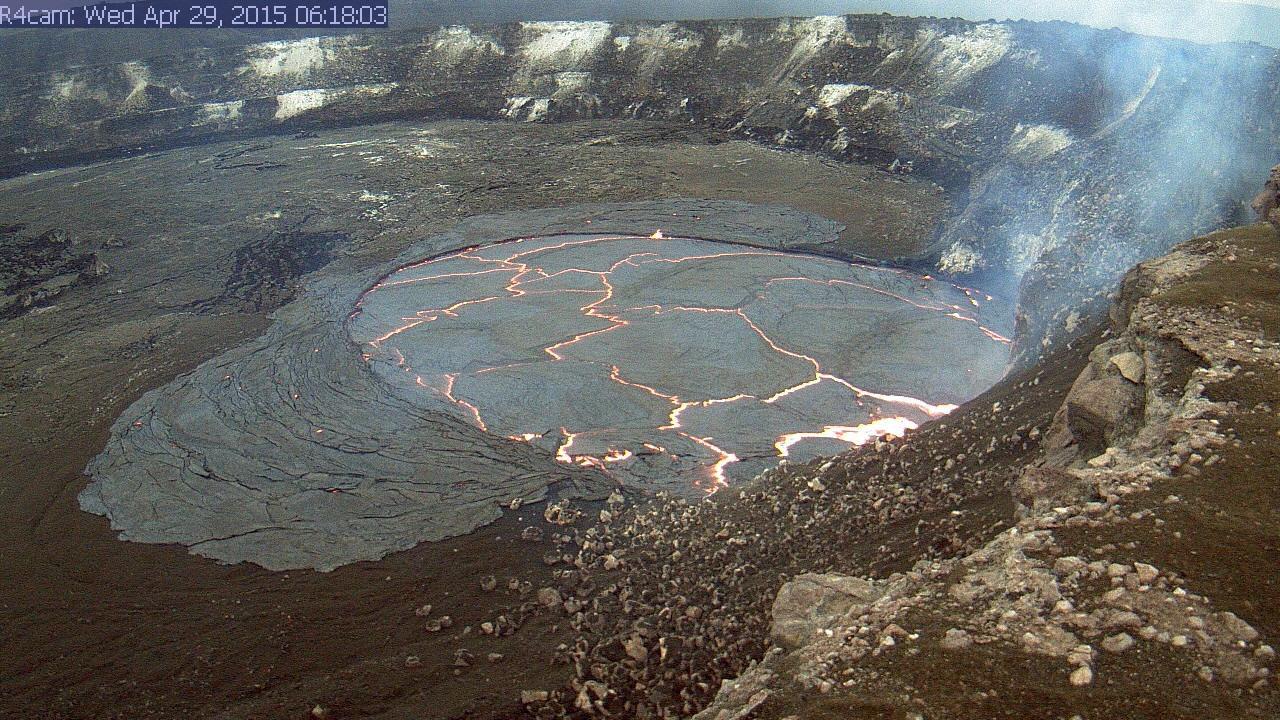 (USGS photo) An early morning view of the lava lake with a recent overflow onto the floor of Halemaʻumaʻu Crater.