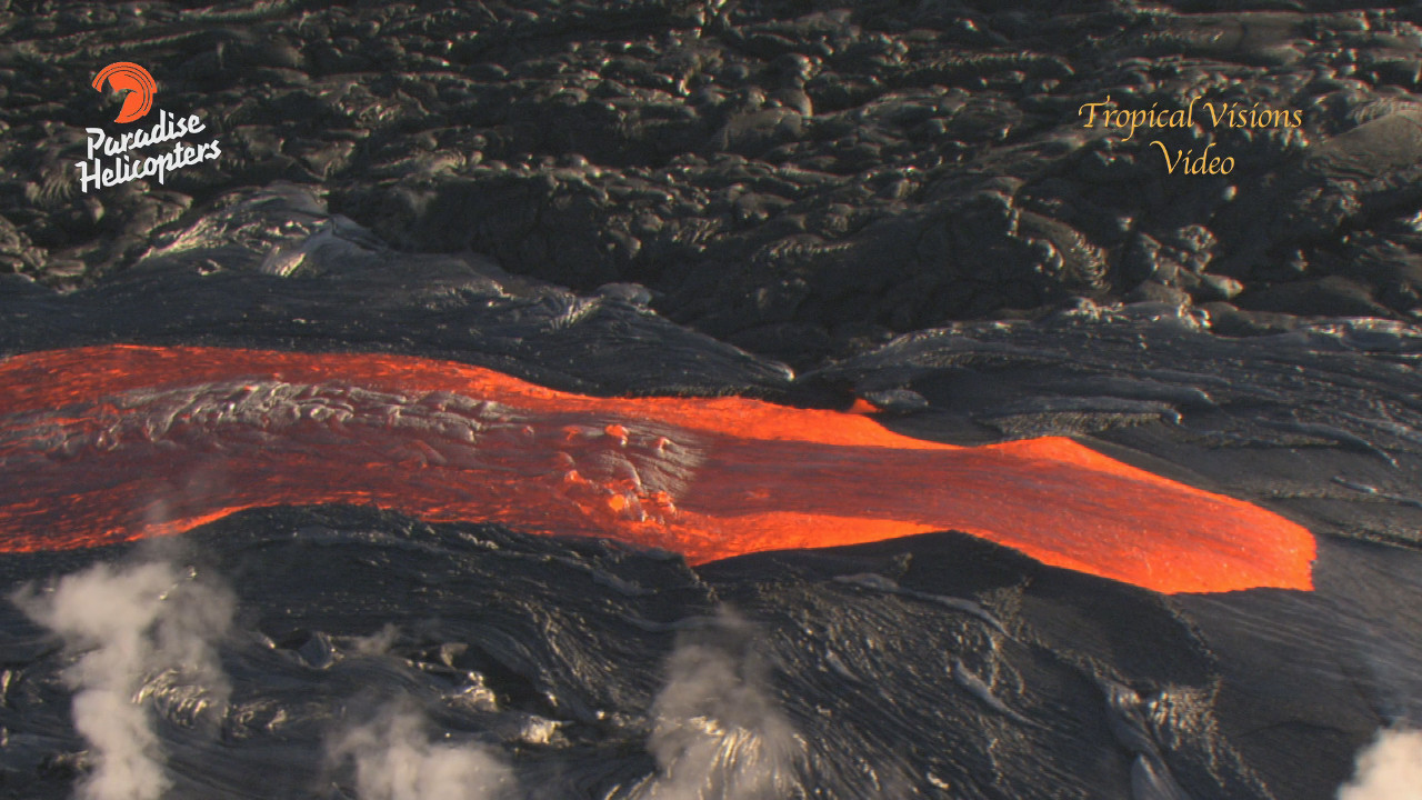 Today's lava breakout was captured by Mick Kalber of Tropical Visions Video aboard Paradise Helicopters.  