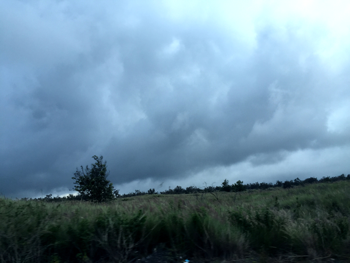 Dark clouds mauka Puuanahulu, photo by David Corrigan at 2:45 p.m. HST on Sunday.