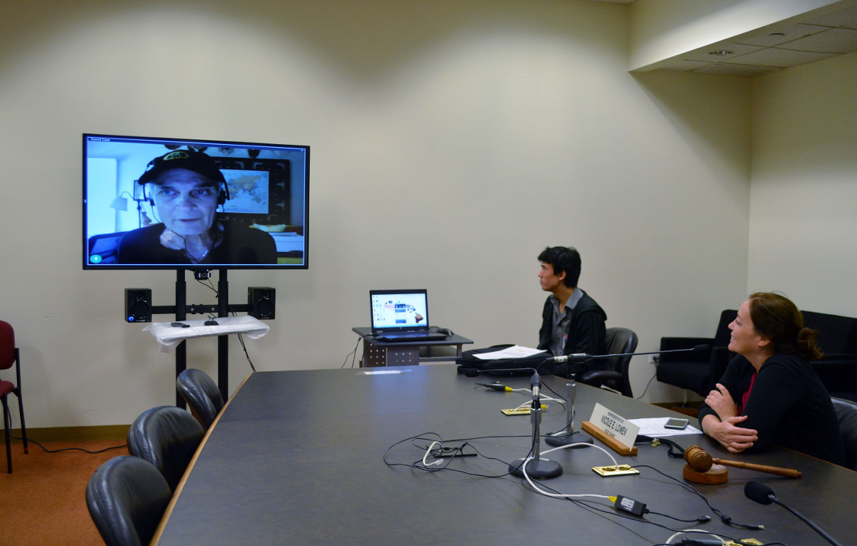 Rep. Lowen looks on during a demonstration of the remote testimony pilot project at the State Capitol. On March 1, the House committee was able to successfully communicate with Kailua-Kona resident David Case. (State House photo)