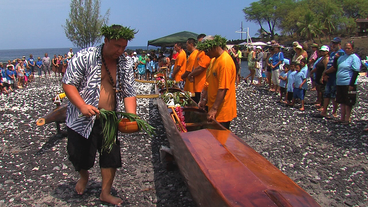 Mahina Kaupiko blesses the Nai'a on the shore of Miloli'i on April 23, 2016.