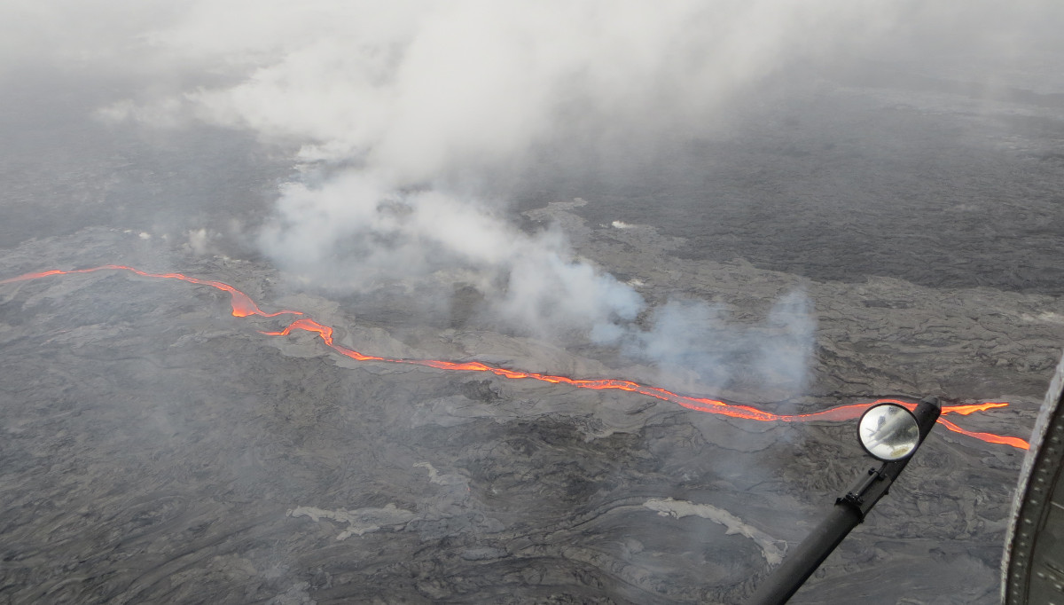 USGS photo: This morning (May 25, 2016), the northern breakout on Puʻu ʻŌʻō was feeding an impressive channel of lava that extended about 950 m (0.6 mi) northwest of the cone. This channel was about 10 m (32 ft) wide as of 8:30 a.m., HST.