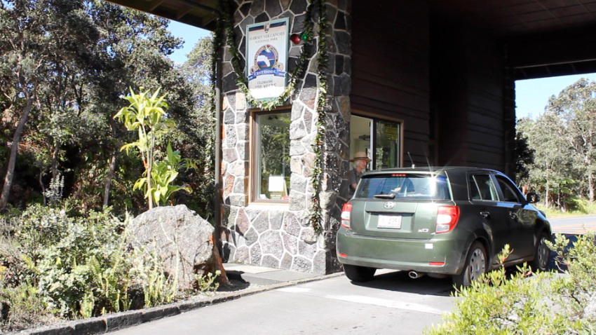 Visitors were treated to free entry to Hawai‘i Volcanoes National Park on its 100th anniversary, August 1. The entrance station was draped in two 40-foot tī leaf lei made by park staff . NPS Photo/Sami Steinkamp.