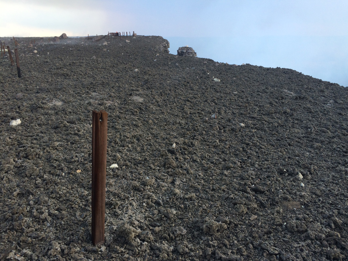 (USGS photo) The tephra deposit was thickest to the east of the former visitor overlook on the crater rim (shown here), where it formed a continuous layer.