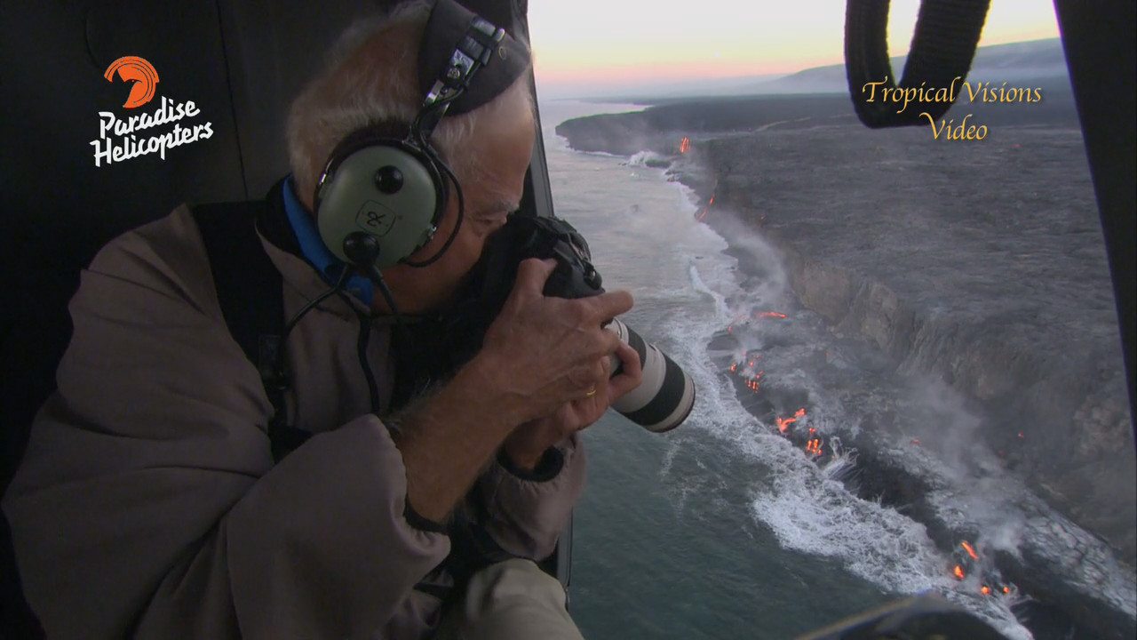 John Chaney takes a shot of the growing lava ocean entry, image from video by Mick Kalber.