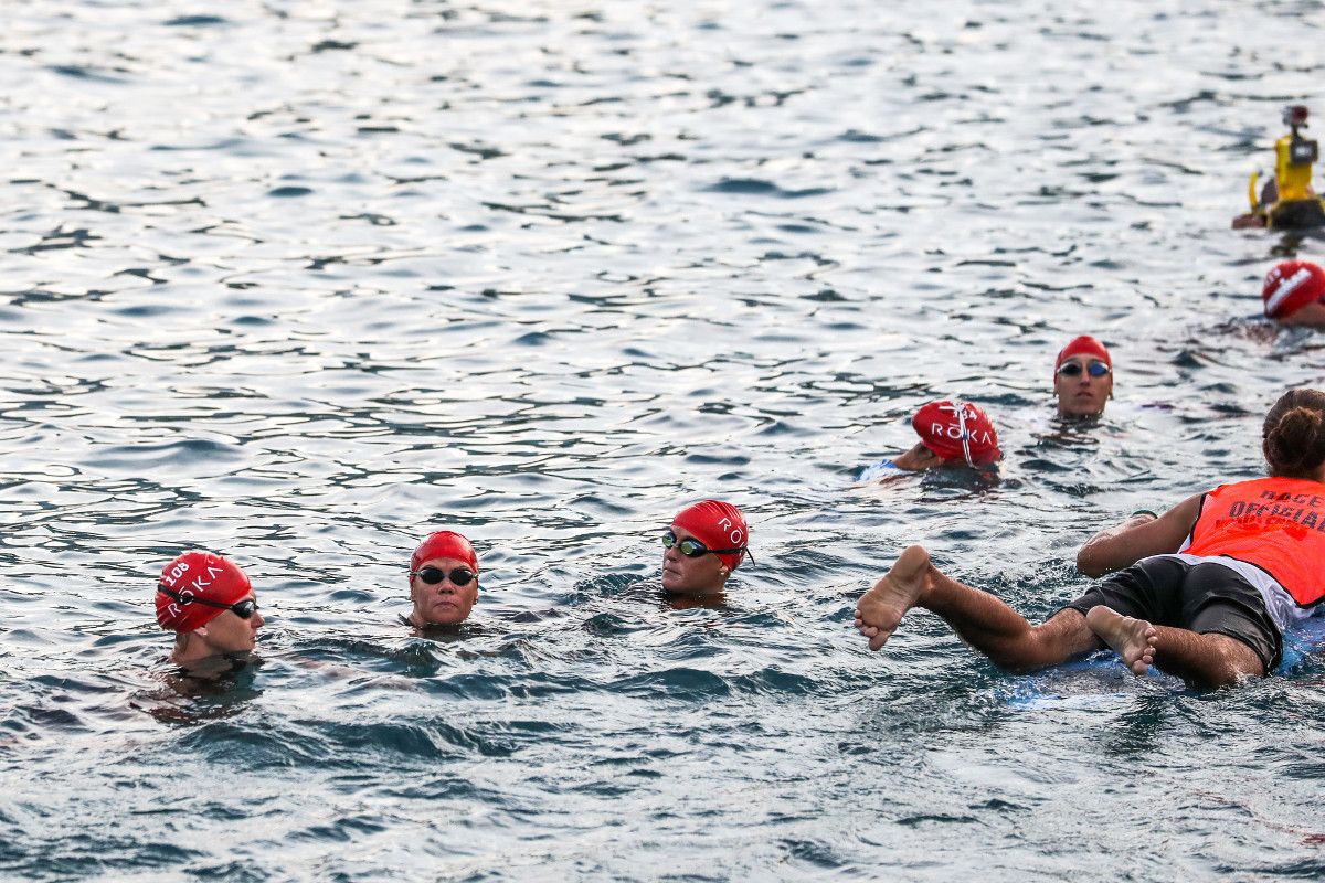 DEEP THOUGHTS. Three-time IRONMAN World Champion Mirinda Carfrae (second from left) focuses on the task at hand, as professional female athletes wait for the start of the 2016 IRONMAN World Championship in Kailua-Kona, Hawai`i (Tony Svensson/IRONMAN) – Copyright © 2016 IRONMAN, All rights reserved.