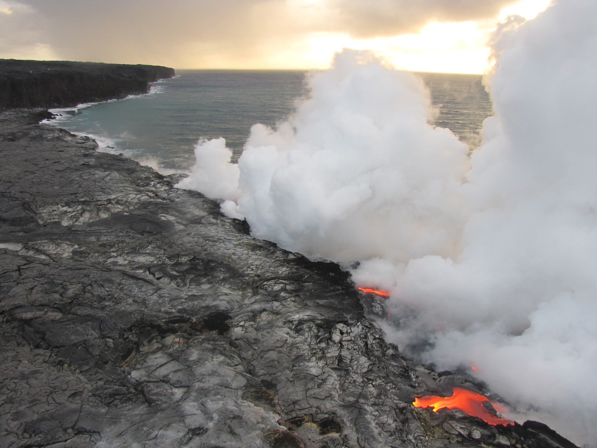 (Photo by Rick Hazlett, University of Hawaiʻi at Hilo) An aerial image of the east Kamokuna lava delta this morning shows lava entering the ocean at the front of the delta.