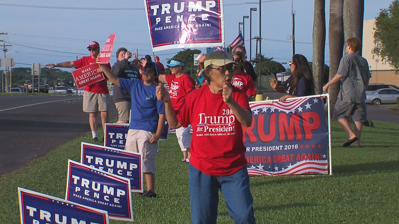 Roughly 20 Trump supporters stood by the highway in Hilo to show support for their presidential candidate on Monday.