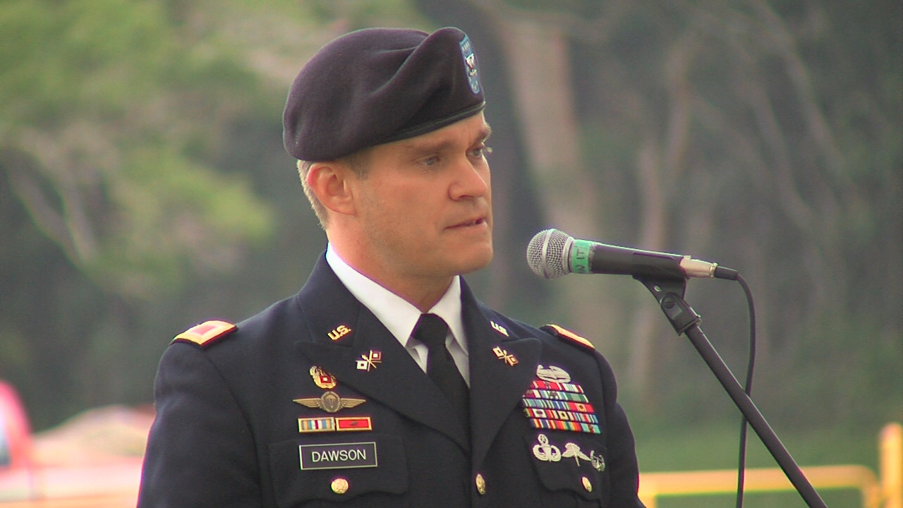 Colonel Stephen E. Dawson, U.S. Army Garrison-Hawaii commander, introduces Congresswoman Tulsi Gabbard on Friday.