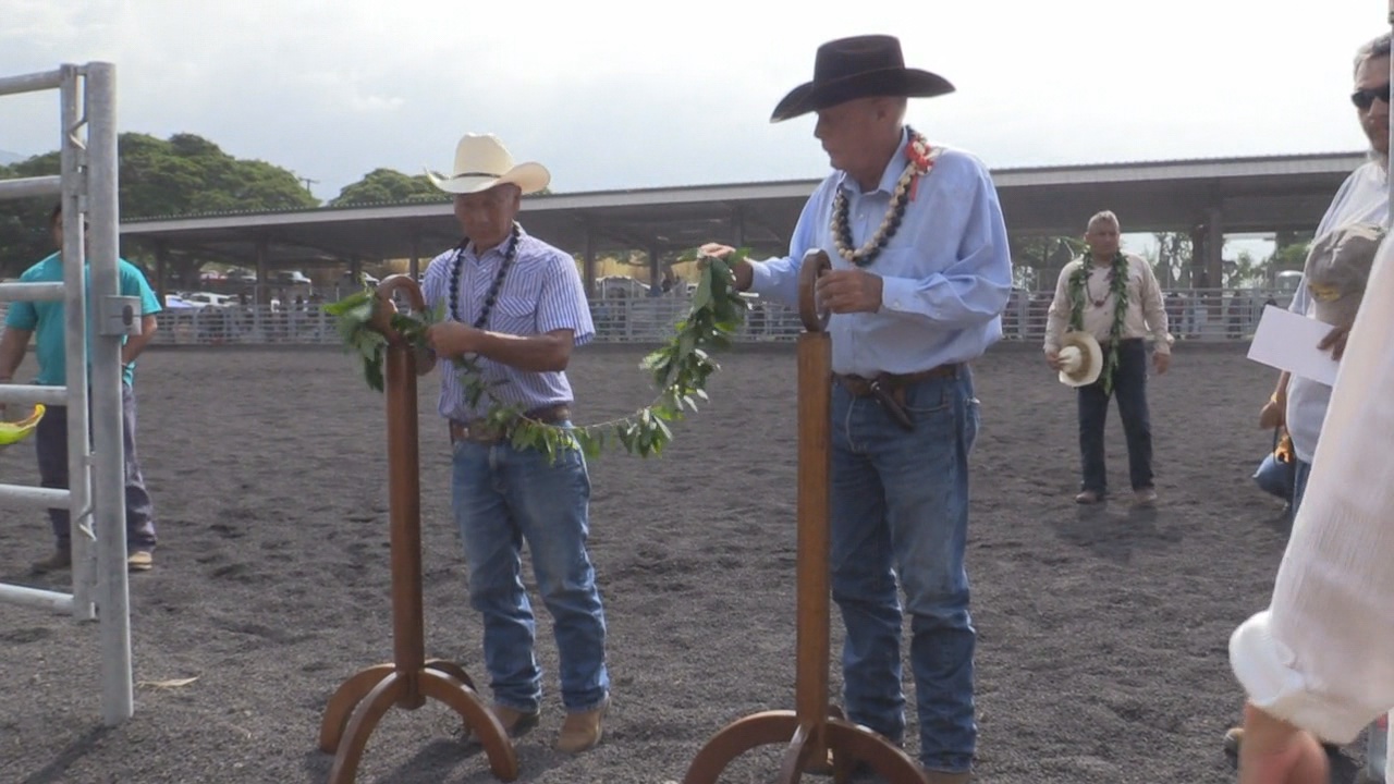 The untying of the maile lei at the gate of the new and improved arena. Courtesy County of Hawaii.