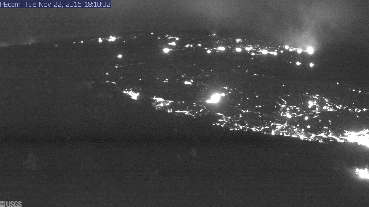 This evening's view from a temporary research camera positioned northeast of Puʻu ʻŌʻō, on Puʻu Halulu, looking southwest toward the northeast flank of Puʻu ʻŌʻō. At night the active lava reveals itself compared to the image of the same flow taken from the same webcam in the daylight (above).
