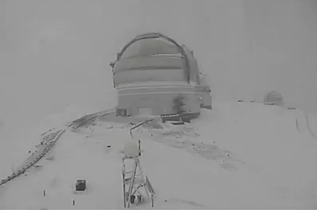 Image from the Canada France Hawaii Telescope webcam taken Friday on the snowy summit.